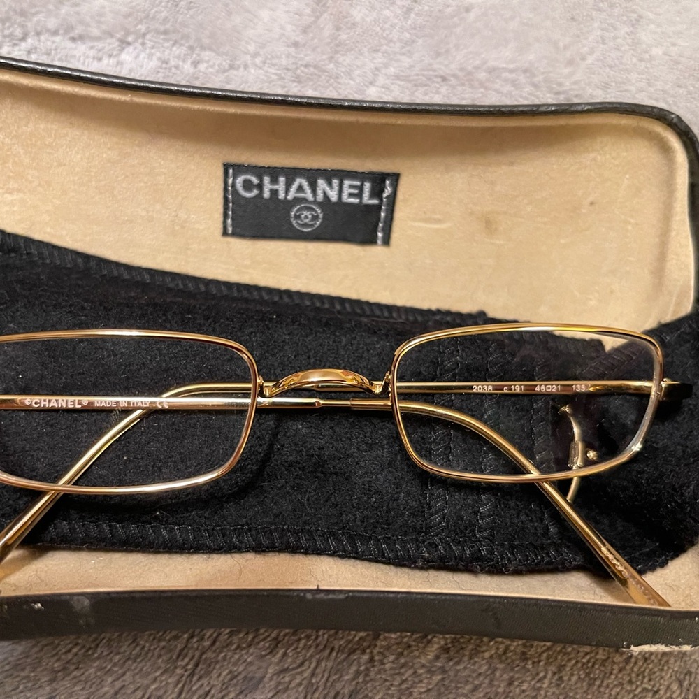 Chanel gold optical frame. Bridge of frame sets on nose